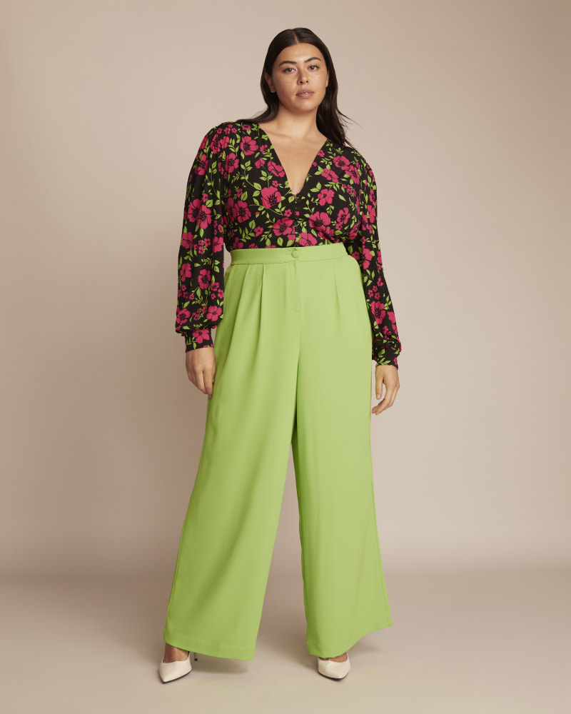 Front of a model wearing a size 14 Macy Wide Leg Pant in Jasmine Green by 11 Honoré Collection. | dia_product_style_image_id:231211